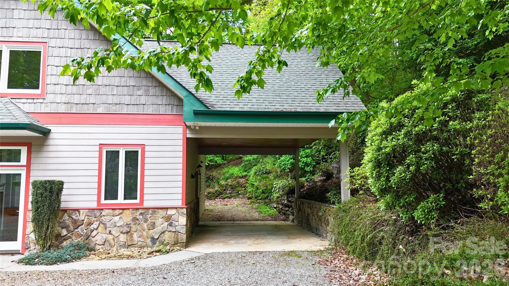 Covered parking at the entrance to your home. - Waynesville