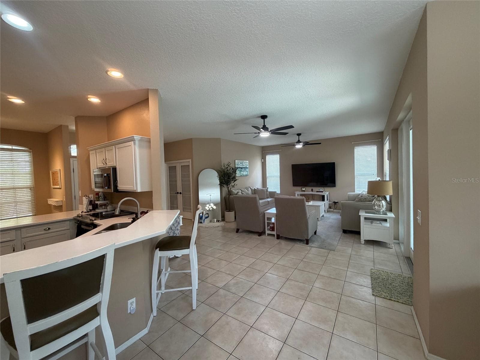 Family room and kitchen - 217 36TH ST NE, BRADENTON