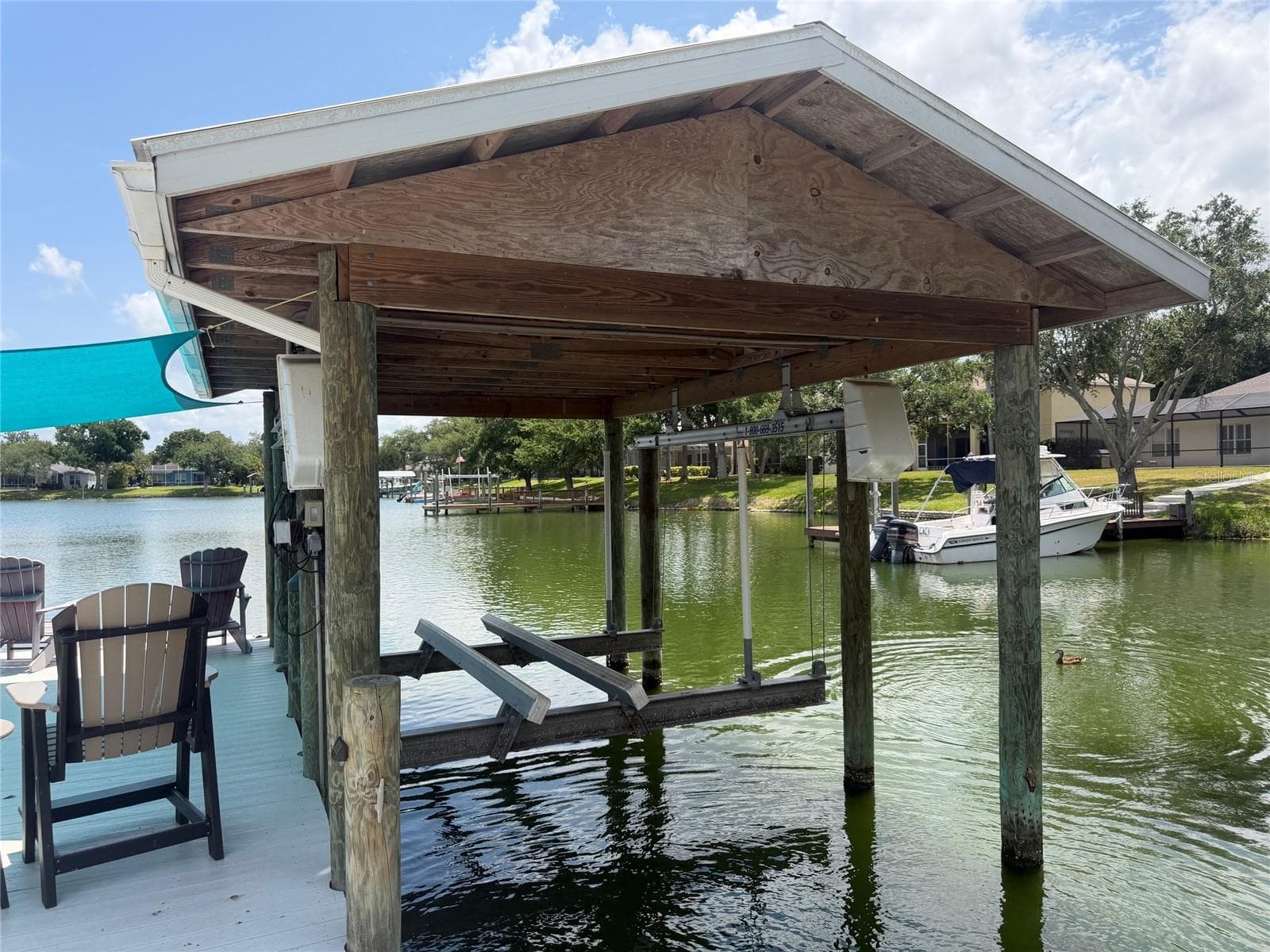 Close up of boat lift - 217 36TH ST NE, BRADENTON