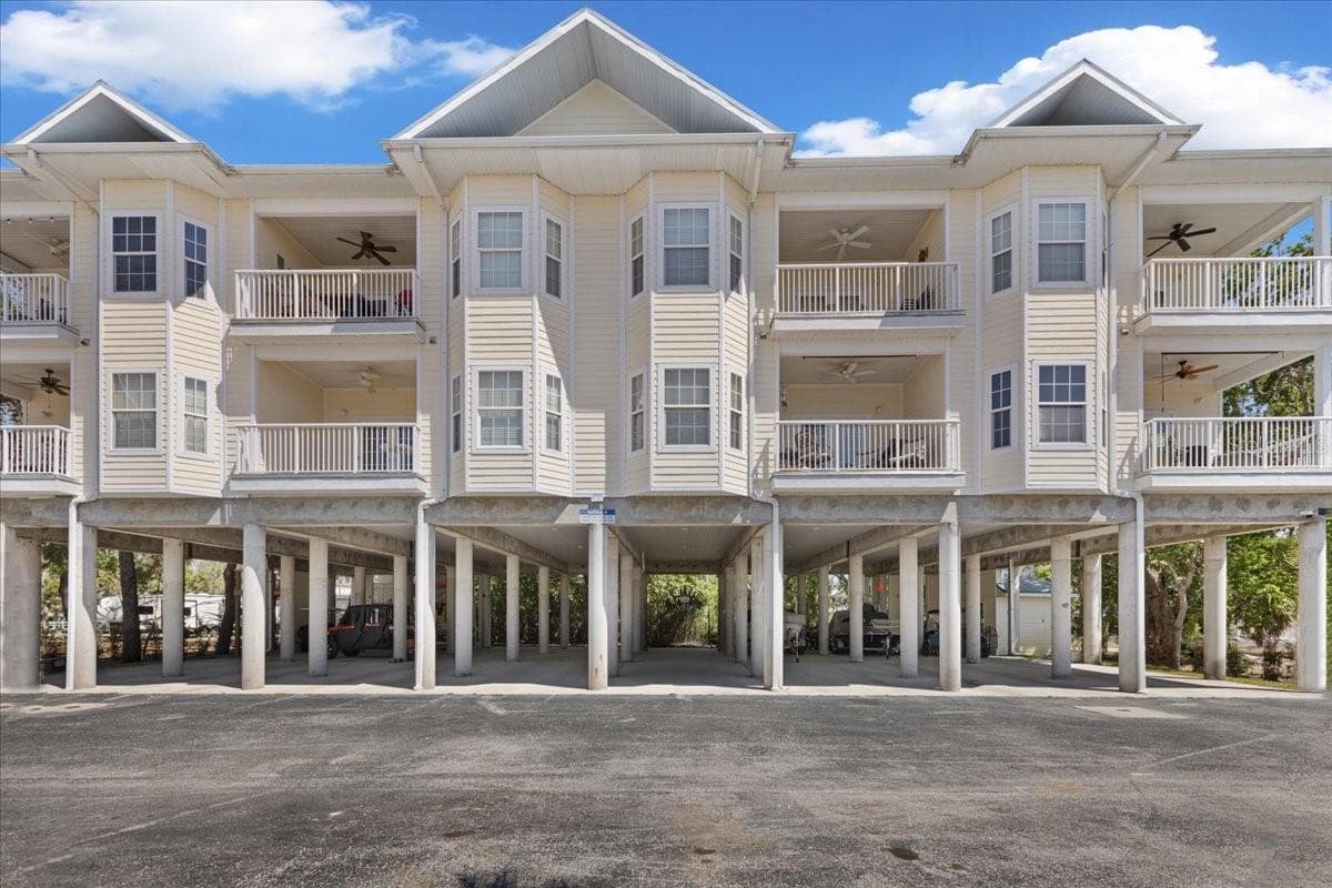 Condominium at 54 SE 910TH AVE #115, SUWANNEE, photo 57 of 70