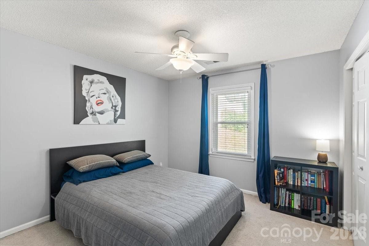 Versatile secondary bedroom at the back of the home, ready for family, guests or a flex space - Charlotte