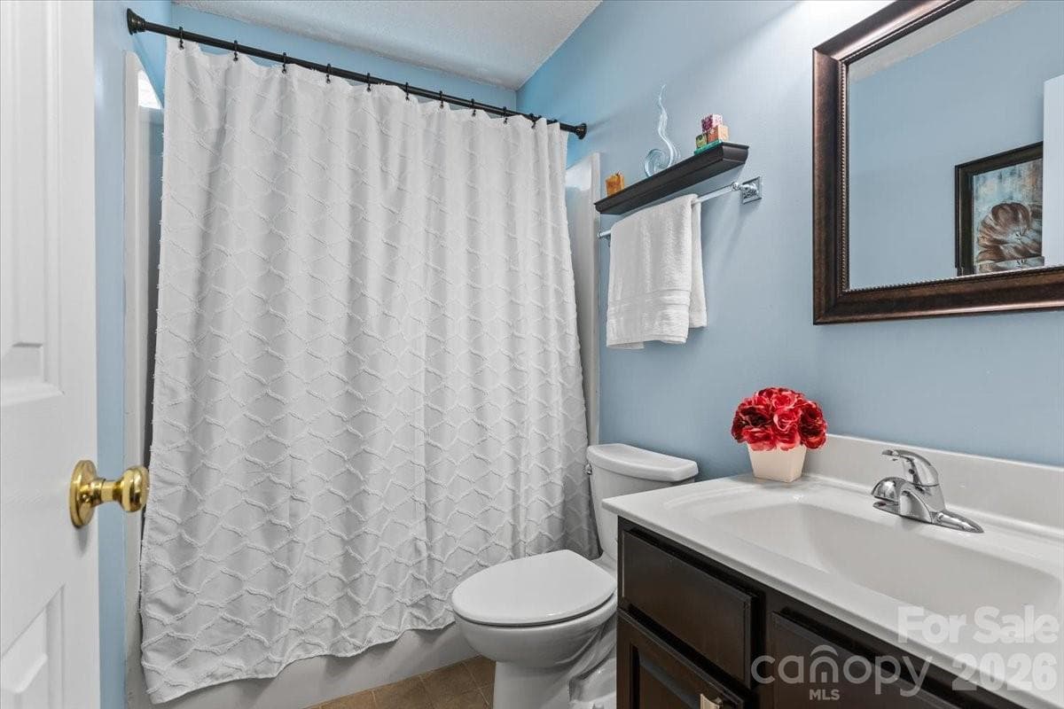 Full hall bath conveniently located near the secondary bedrooms - Charlotte