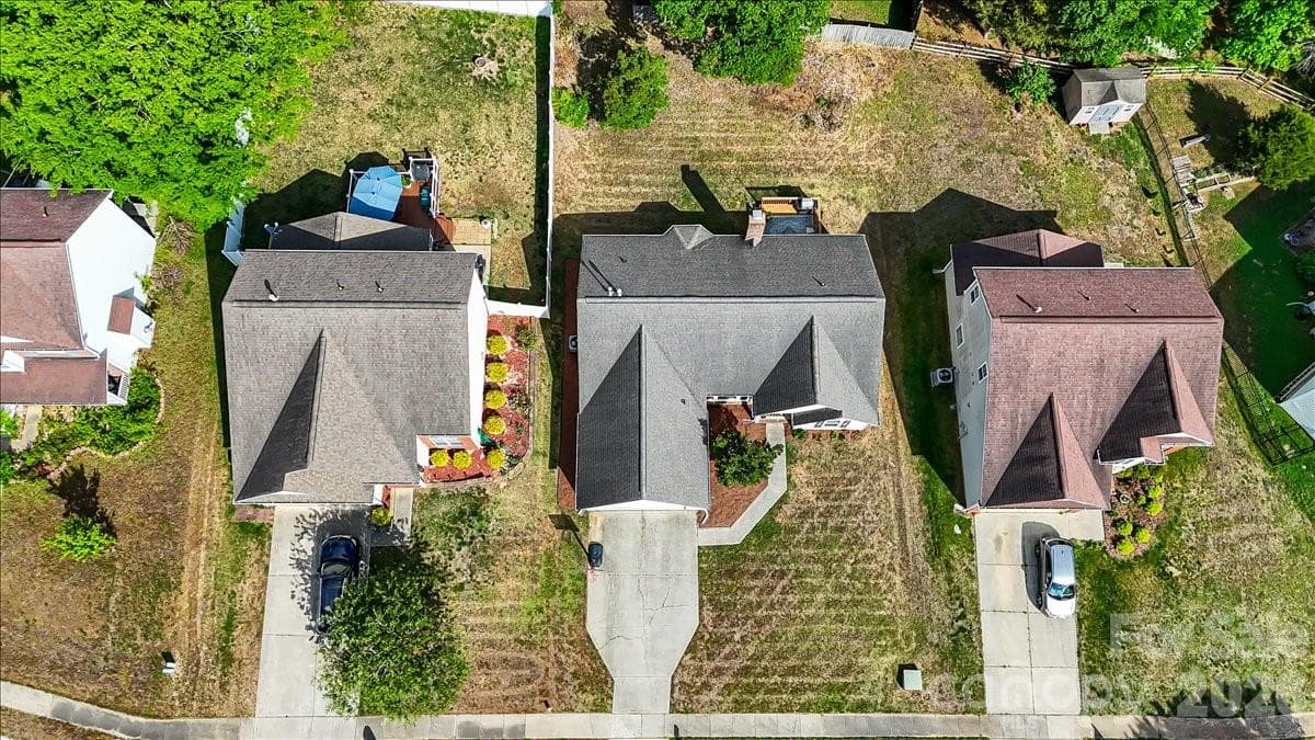 Front & center, this well maintained home looks great from above. - Charlotte