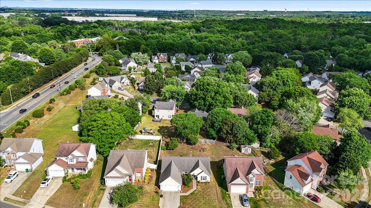 That's the one... the third house from the right. Mature trees provide privacy in the back. - Charlotte