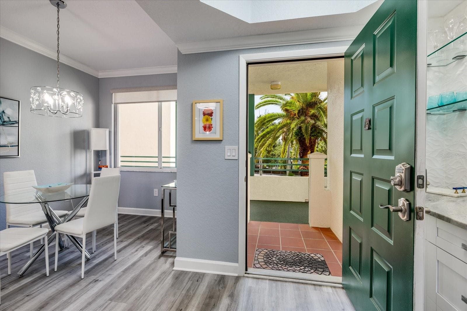 Dining area & entrance to condo - 4801 OSPREY DR S #207, ST PETERSBURG