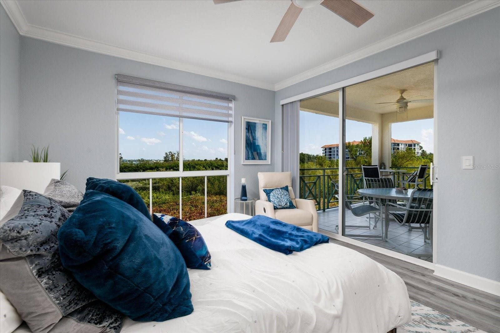 Primary Bedroom with sliders to  Private Balcony - 4801 OSPREY DR S #207, ST PETERSBURG