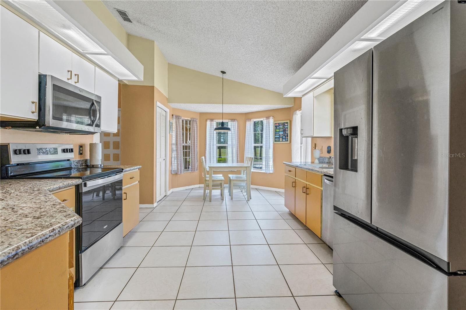High Ceilings in Kitchen too! - 524 CROOKED STICK DR, DAYTONA BEACH