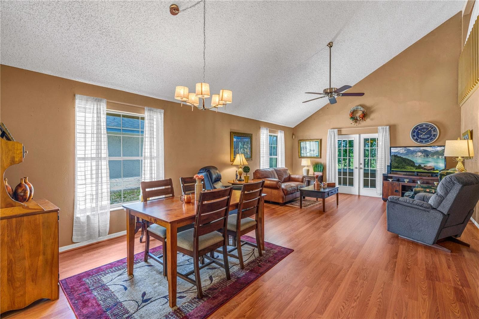 Dining Living Room with Vaulted Ceilings - 524 CROOKED STICK DR, DAYTONA BEACH