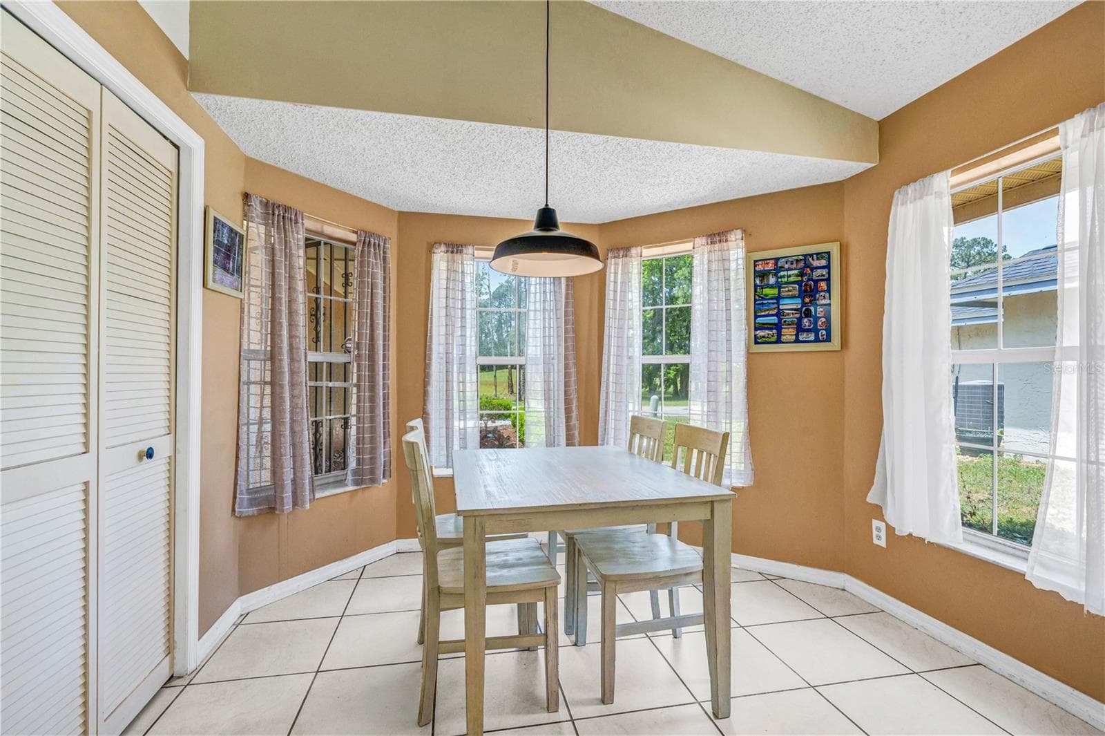 Sunny Breakfast Nook with Pantry - 524 CROOKED STICK DR, DAYTONA BEACH