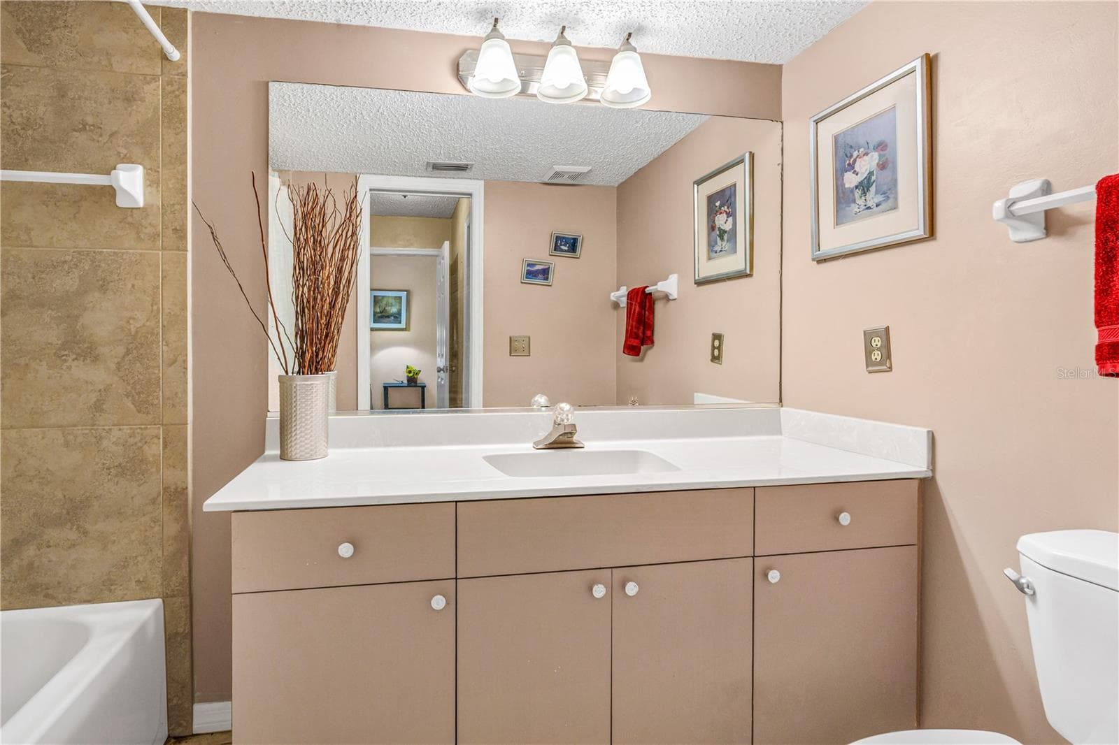 Guest Bathroom Right Outside Guest Bedroom - 524 CROOKED STICK DR, DAYTONA BEACH