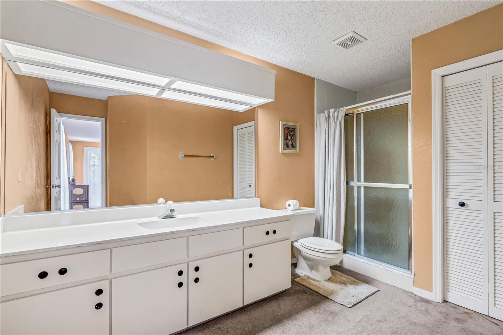 Upstairs Full Bath with Step In Shower - 524 CROOKED STICK DR, DAYTONA BEACH