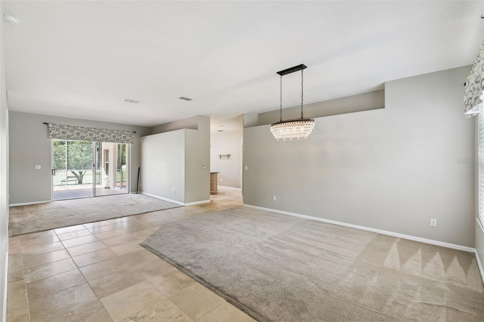 Large front rooms with lots of light. - 237 STRATHMORE CIR, KISSIMMEE