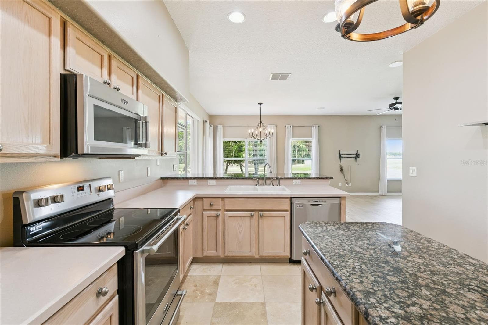 Kitchen island with storage. - 237 STRATHMORE CIR, KISSIMMEE