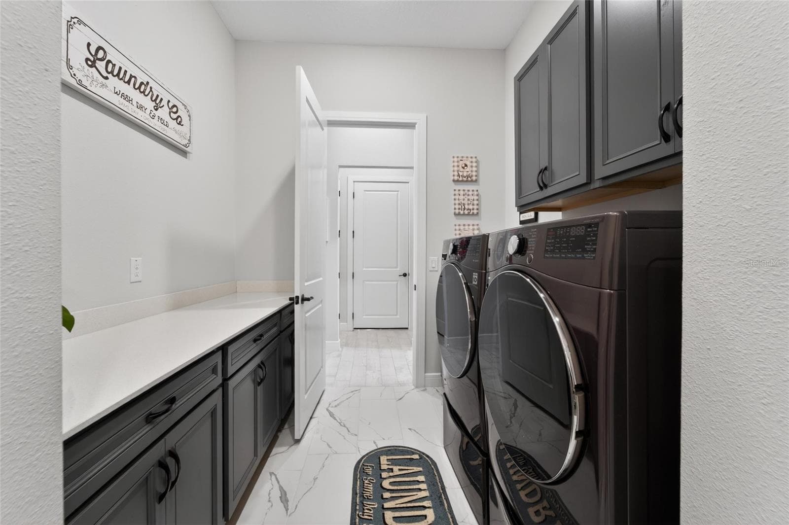 Laundry room - 18752 HORIZON VIEW PT, LAND O LAKES