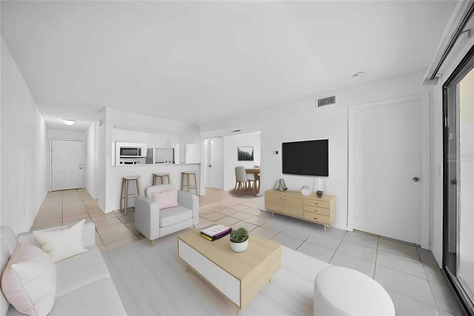 Living Room towards kitchen and dining room-virtually staged - 3001 58TH AVE S #1005, ST PETERSBURG