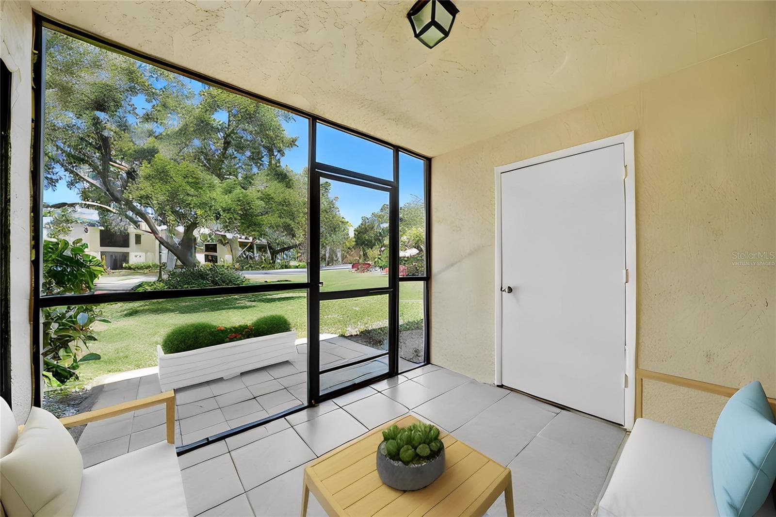 Lanai virtually staged - 3001 58TH AVE S #1005, ST PETERSBURG