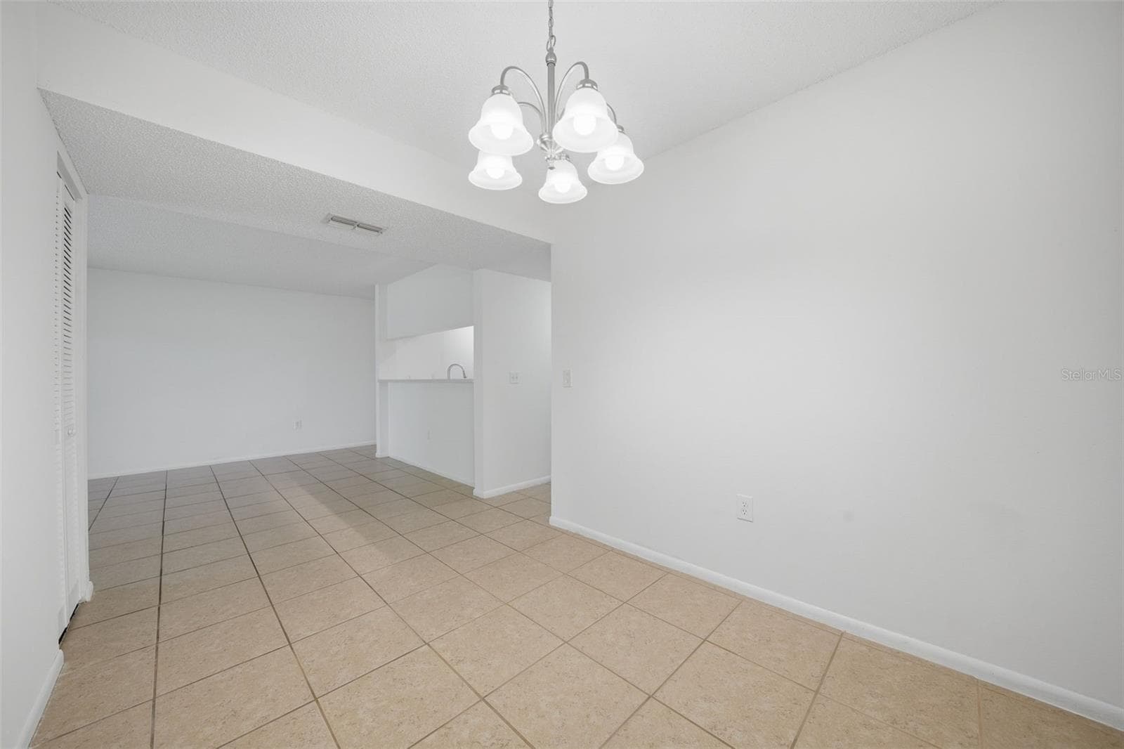 Dining room to kitchen - 3001 58TH AVE S #1005, ST PETERSBURG