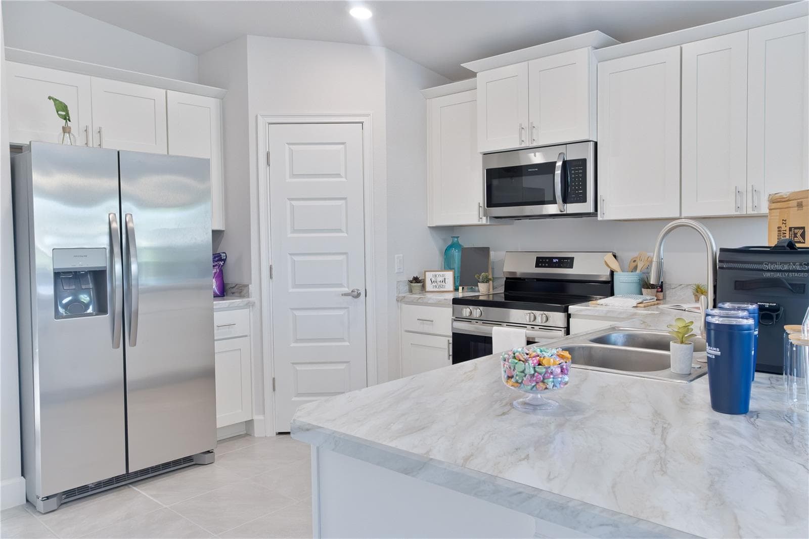 One or more photos may be virtually staged. Actual home shown; finishes, colors, and features may vary. - 1841 N ROBERTS TRL, BELL