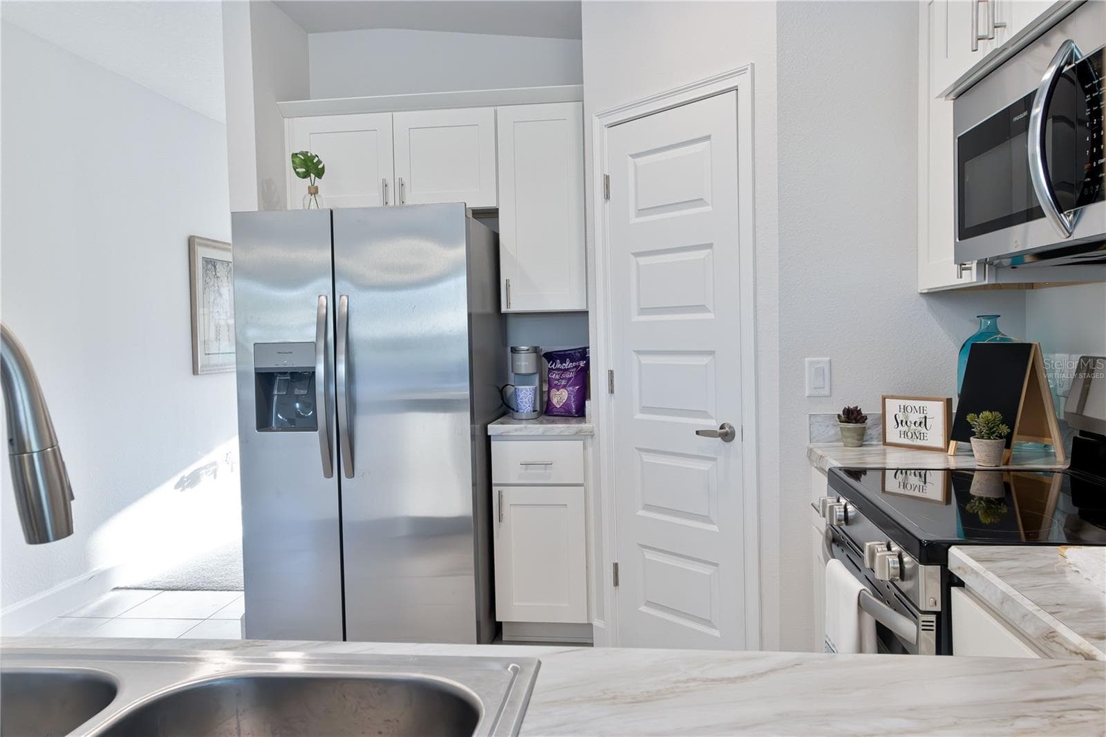 One or more photos may be virtually staged. Actual home shown; finishes, colors, and features may vary. - 1841 N ROBERTS TRL, BELL