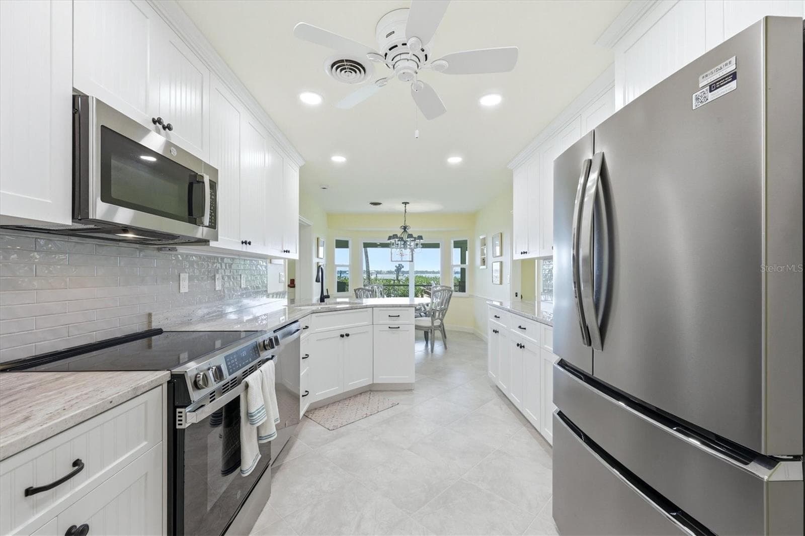Updated Kitchen Open to Breakfast Nook With Bay Views - 6421 MANASOTA KEY RD, ENGLEWOOD