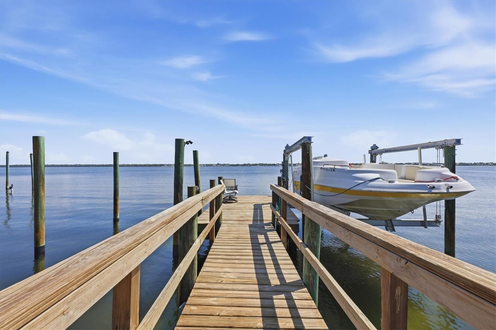 Shared Dock With Pilings for a Lift (current lift belongs to neighbor that shares dock) - 6421 MANASOTA KEY RD, ENGLEWOOD