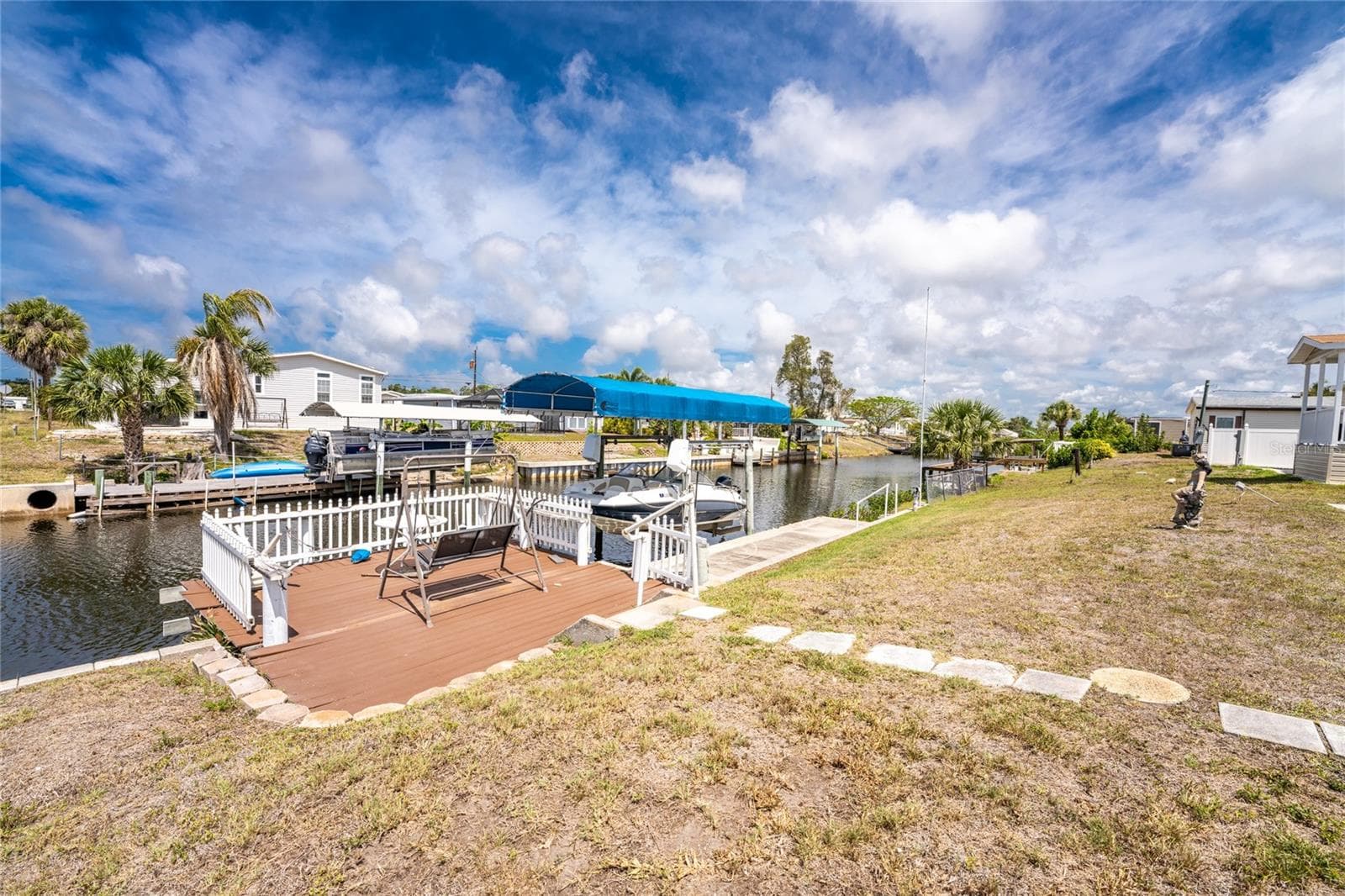 Nicely sized dock to sit out on and watch the other boaters go by! - 1380 SEAGULL DR, ENGLEWOOD