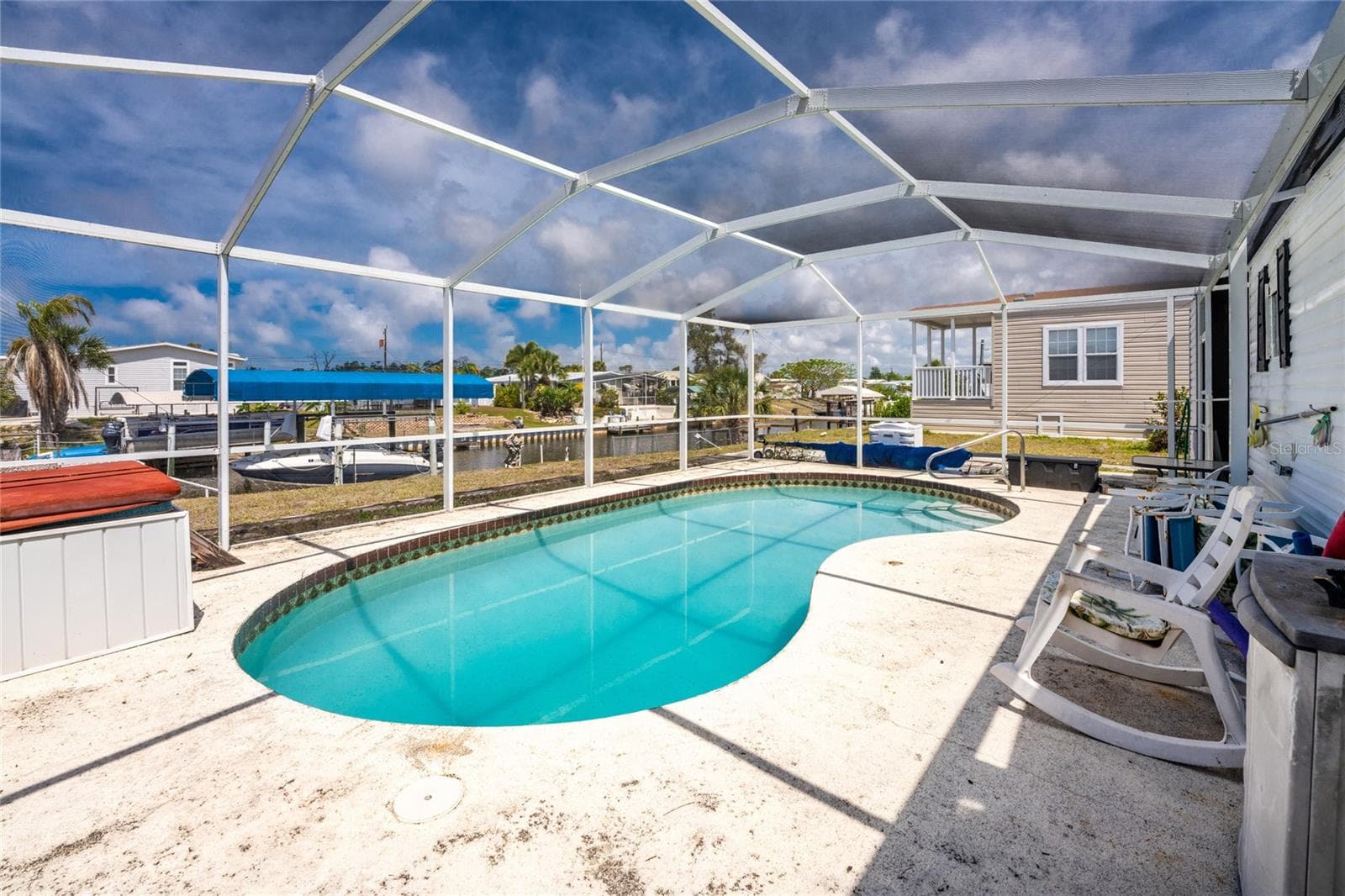 Caged pool - cage was replaced in 2023 - 1380 SEAGULL DR, ENGLEWOOD