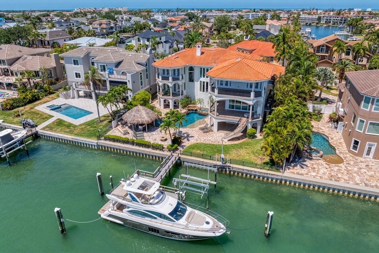 Waterside view of this luxury residence - 611 1ST AVE S, TIERRA VERDE