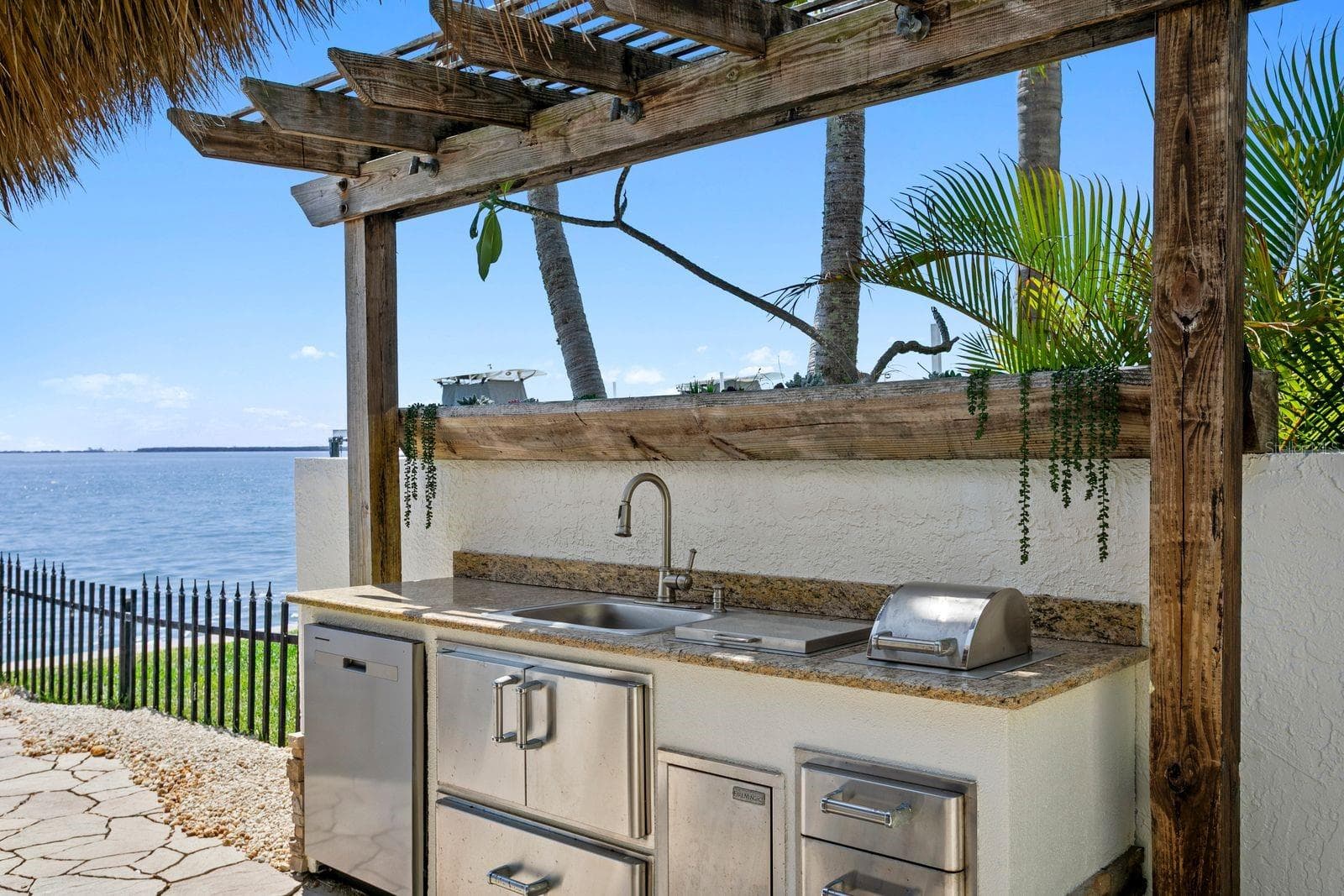 Outdoor kitchen area. - 611 1ST AVE S, TIERRA VERDE