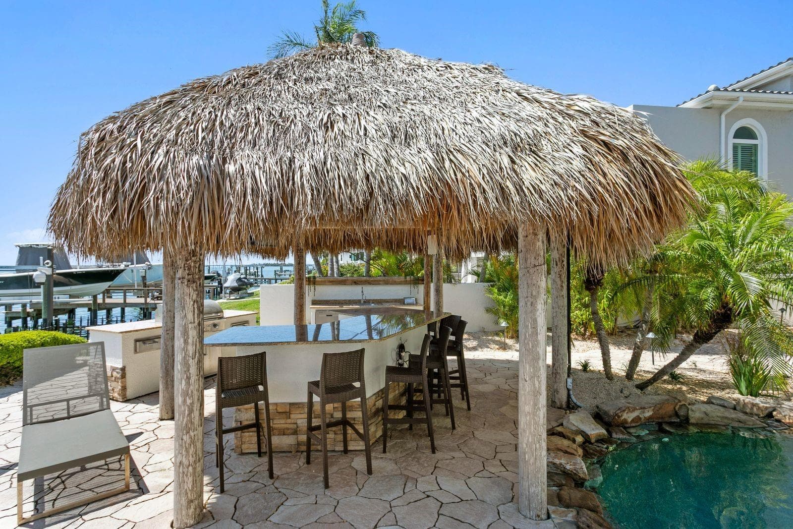 Another view of the tiki hut area. - 611 1ST AVE S, TIERRA VERDE