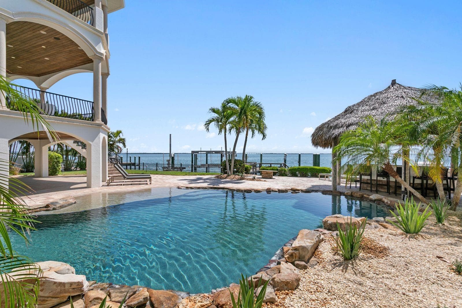 Another view of the tropical outdoor living area. - 611 1ST AVE S, TIERRA VERDE