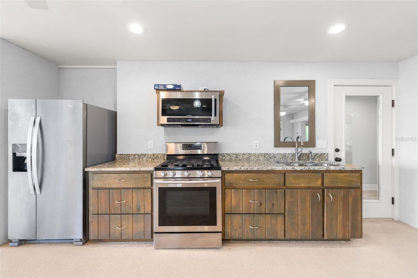 First floor kitchen view to lake - 8026 NE 221ST ST, MELROSE