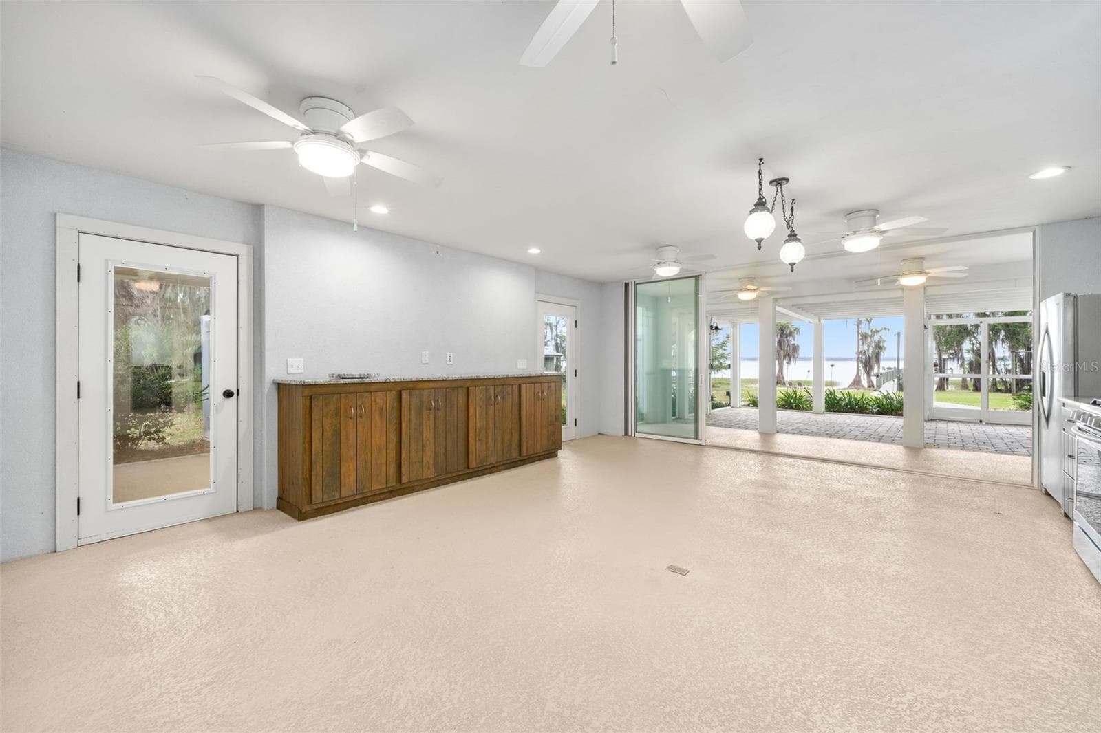 Hobby room 1st floor view to lake - 8026 NE 221ST ST, MELROSE