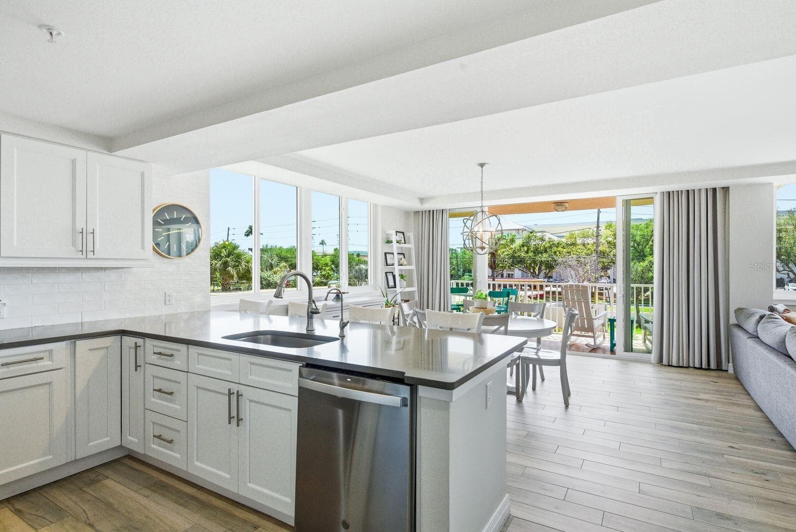 Updated kitchen overlooking the dining/living areas - 223 ISLAND WAY #2D, CLEARWATER BEACH