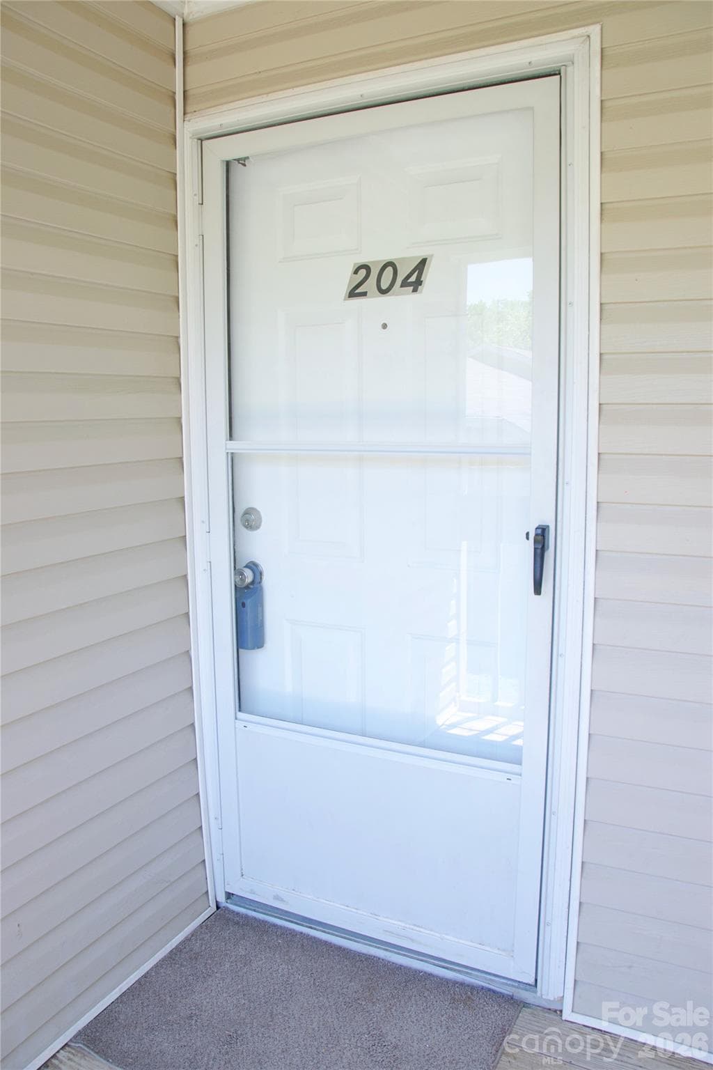 Condo has storm door to let in more natural light - Rock Hill