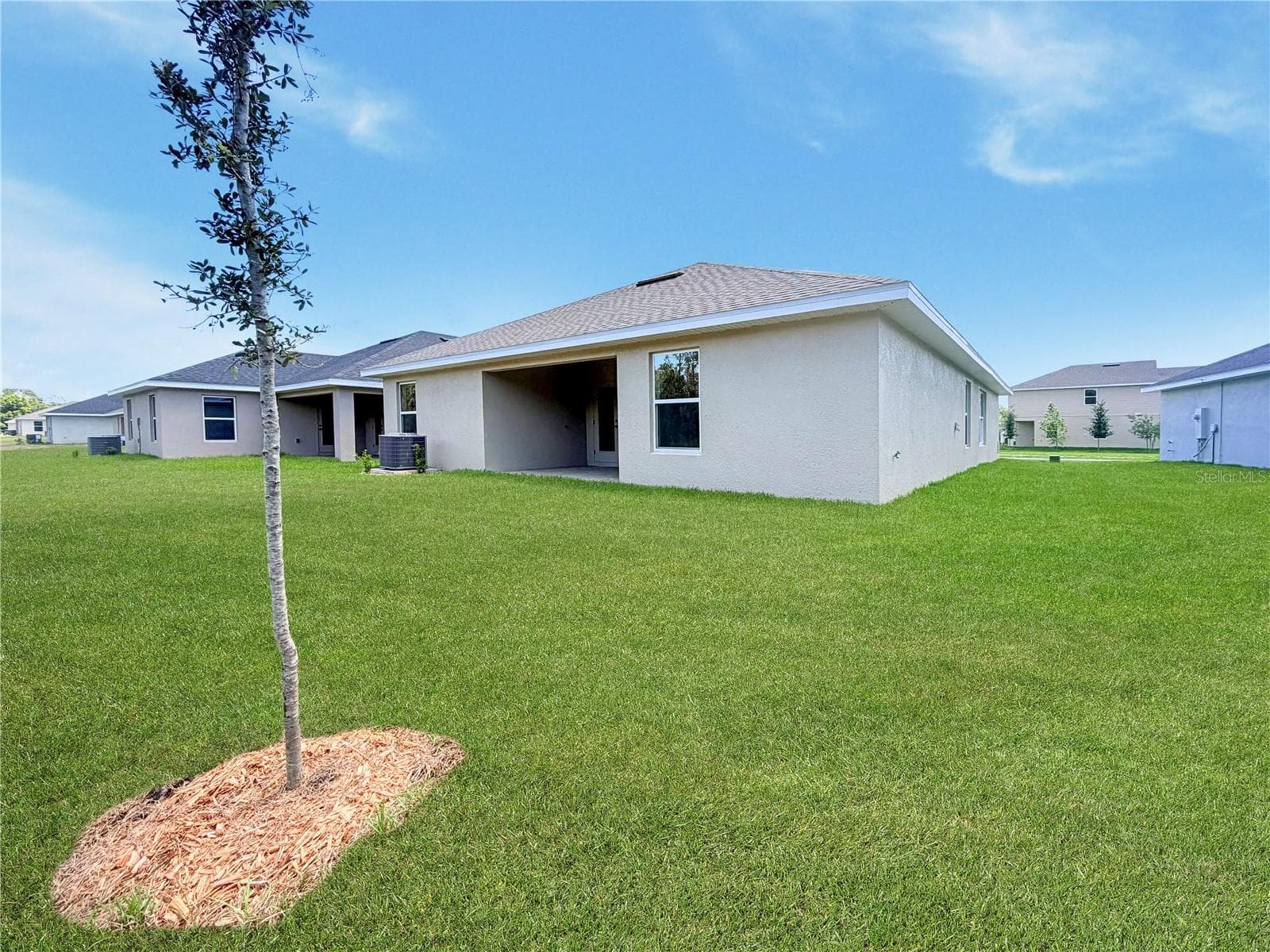 Rear Exterior - 7612 BENT TREE LOOP, ST CLOUD