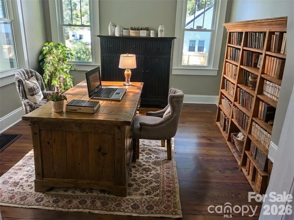Bedroom 3,virtually staged as a home office. Has it's own cozy fireplace. Both fireplaces are ready for gas logs. - 933 W Warren Street, Shelby