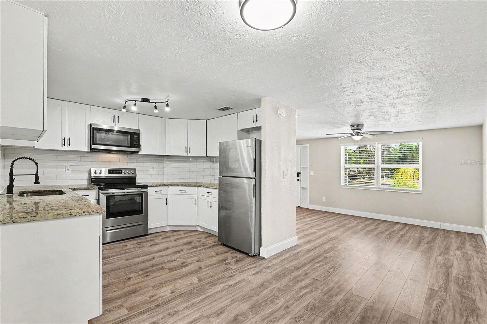 Single Family Residence at 4113 KIBLER LN, HOLIDAY, photo 7 of 22