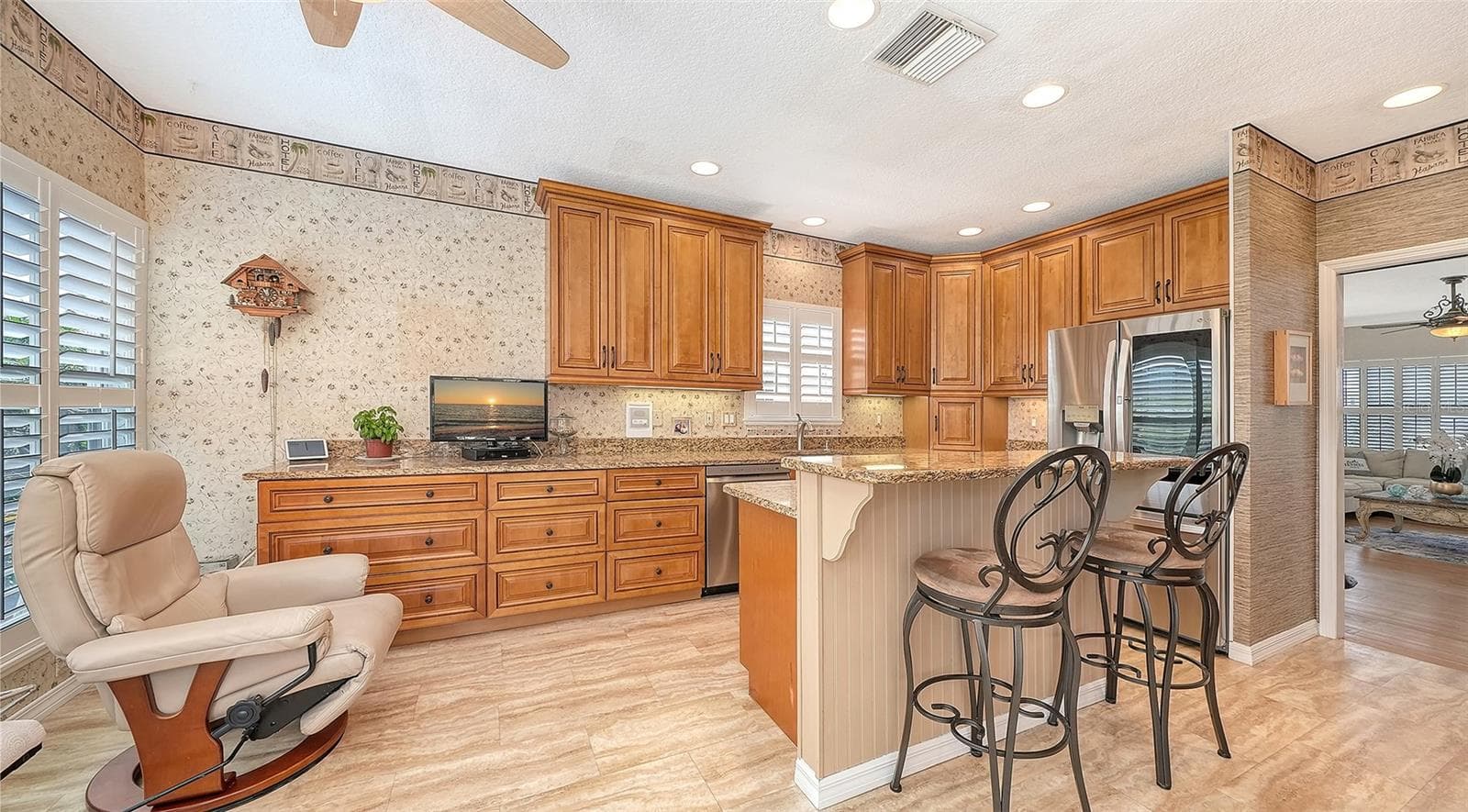 Perfect chef's kitchen with all Stainless appliance package and loads of storage which opens onto a roomy breakfast nook! - 3040 GULF OF MEXICO DR #3, LONGBOAT KEY