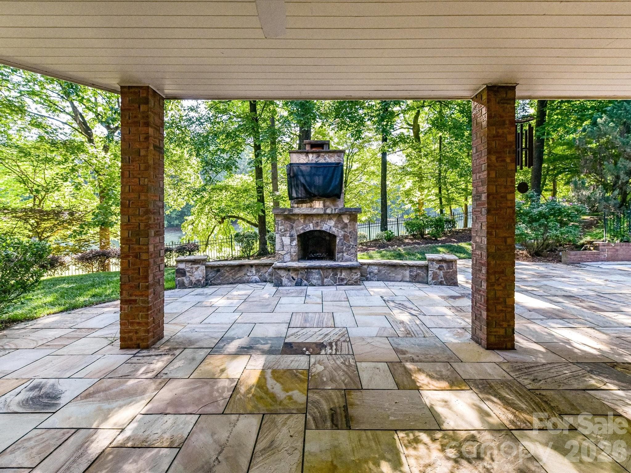 Lower covered patio and outdoor fireplace - Charlotte