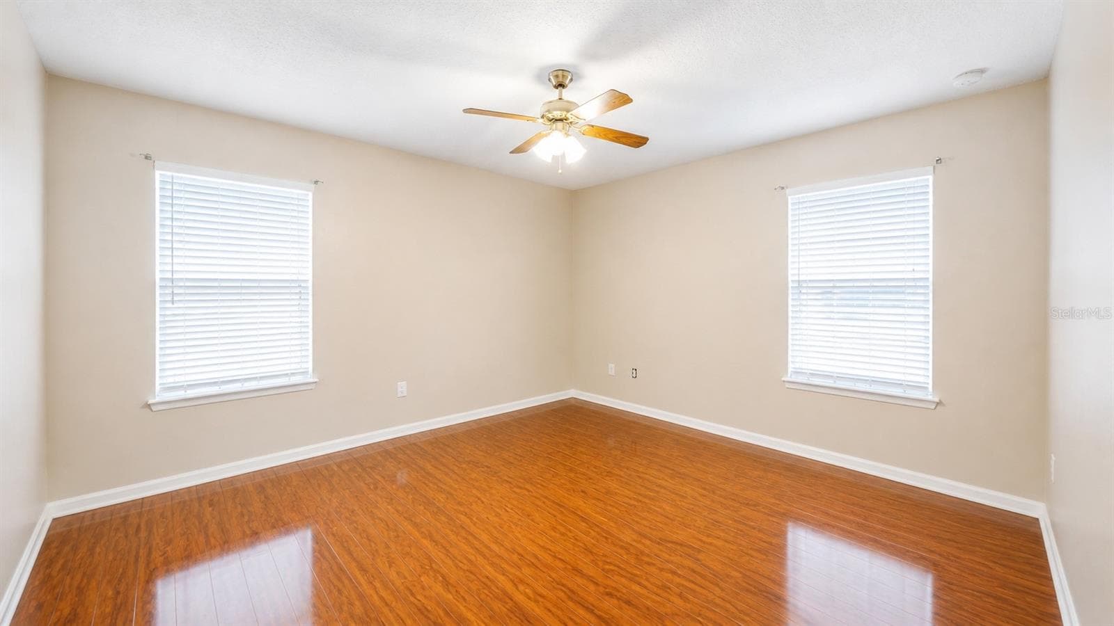 Large primary bedroom in the back of the house on the second floor - 4116 ORANGE TREE CT, ST CLOUD