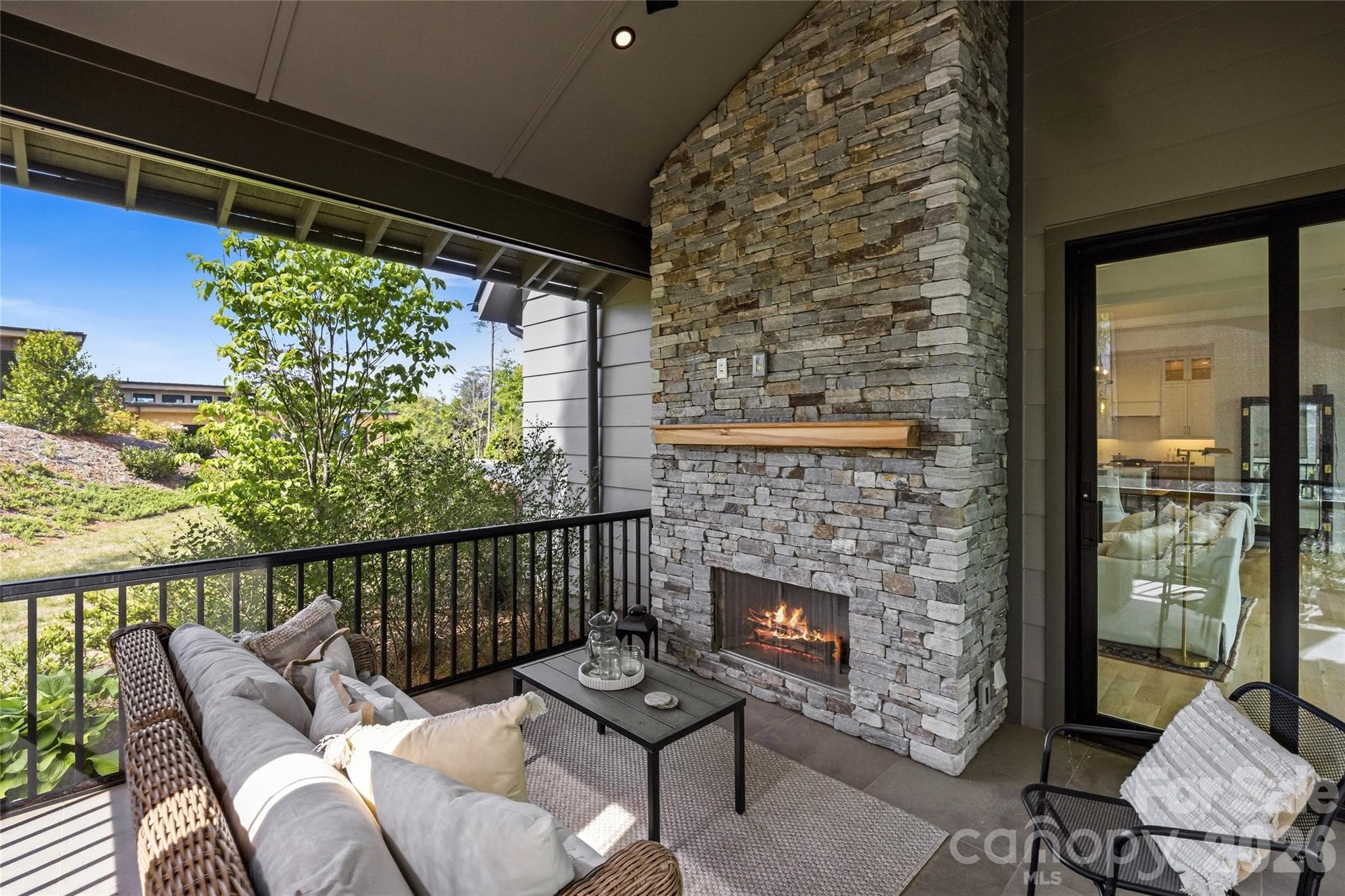 Wood burning stacked stone fireplace - Asheville