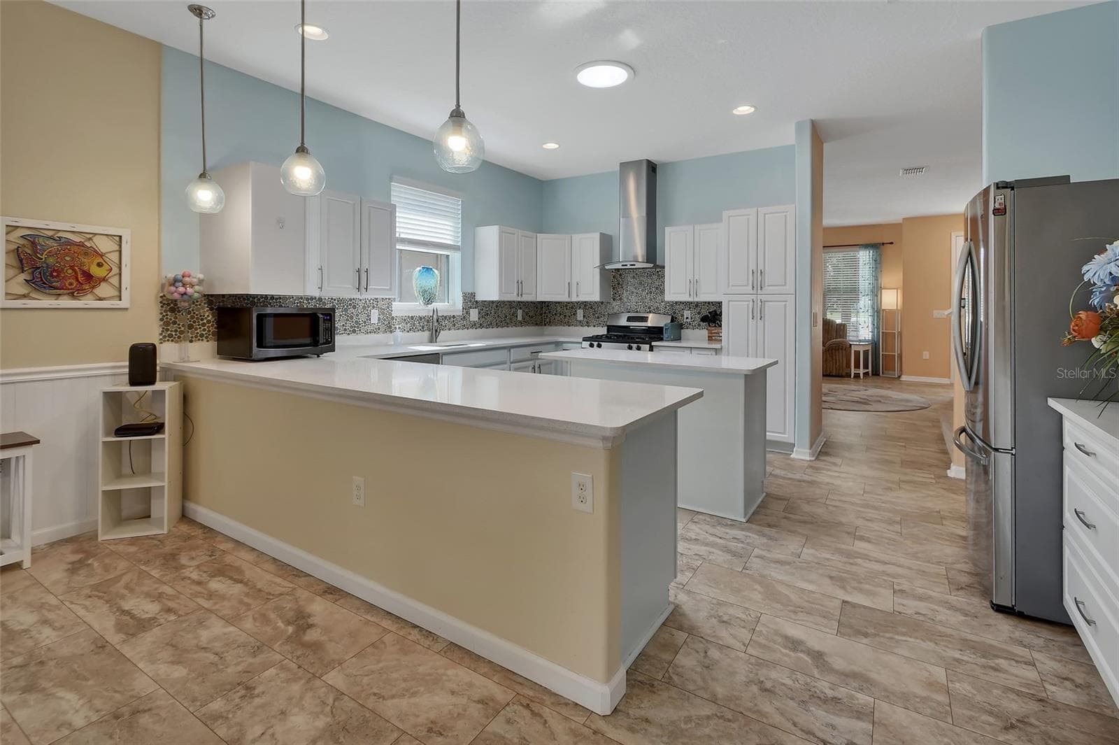 Beautiful Quartz countertops make cooking and baking a breeze. - 337 ORCHARD HILL ST, DELAND