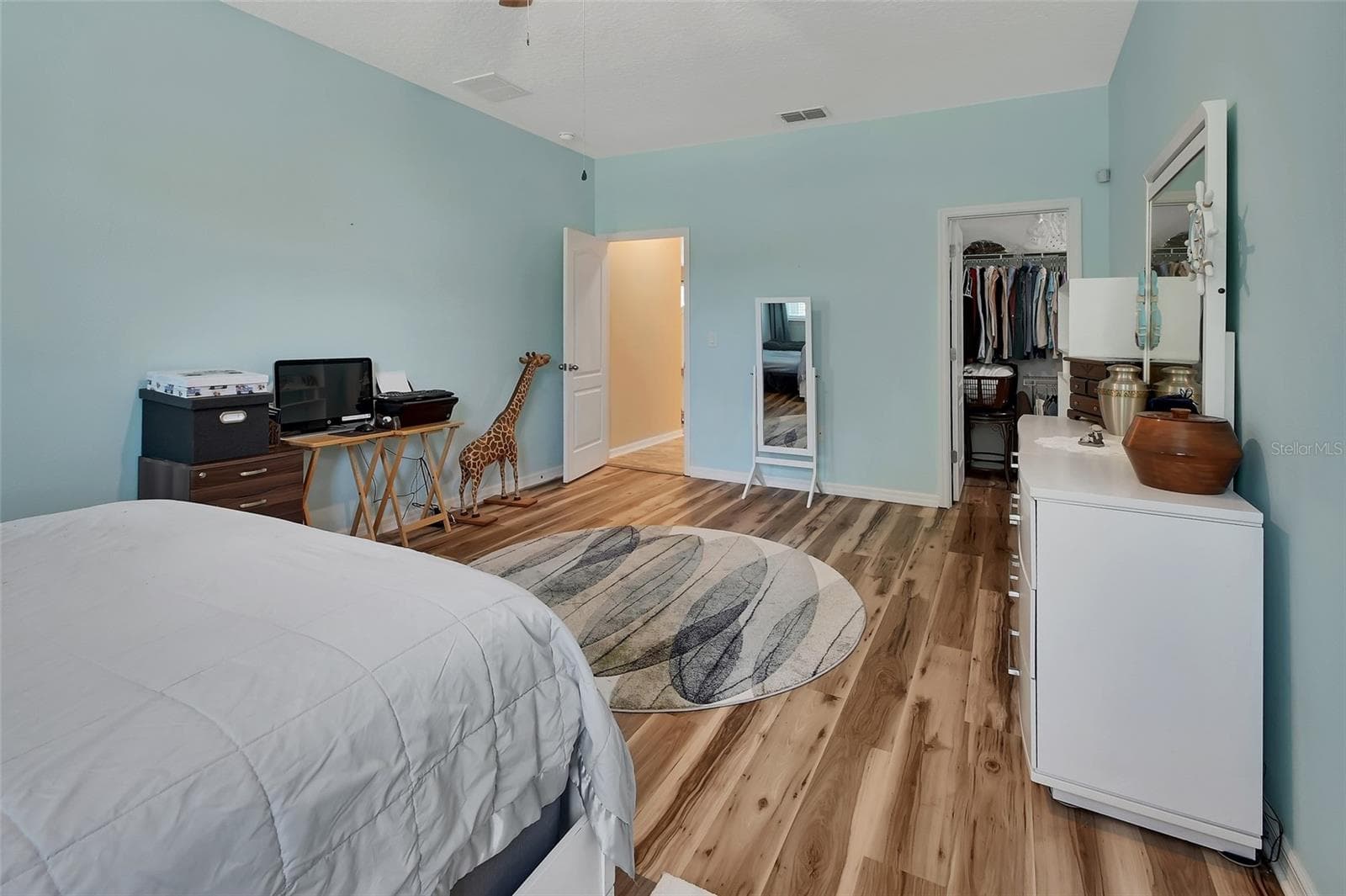 Primary suite has a private foyer entrance and walk-in closet. - 337 ORCHARD HILL ST, DELAND