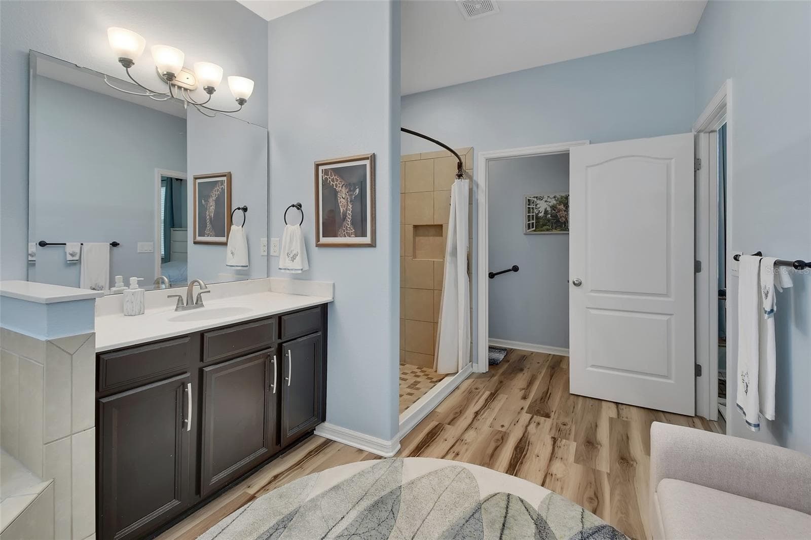 Privacy lavatory with linen closet. - 337 ORCHARD HILL ST, DELAND