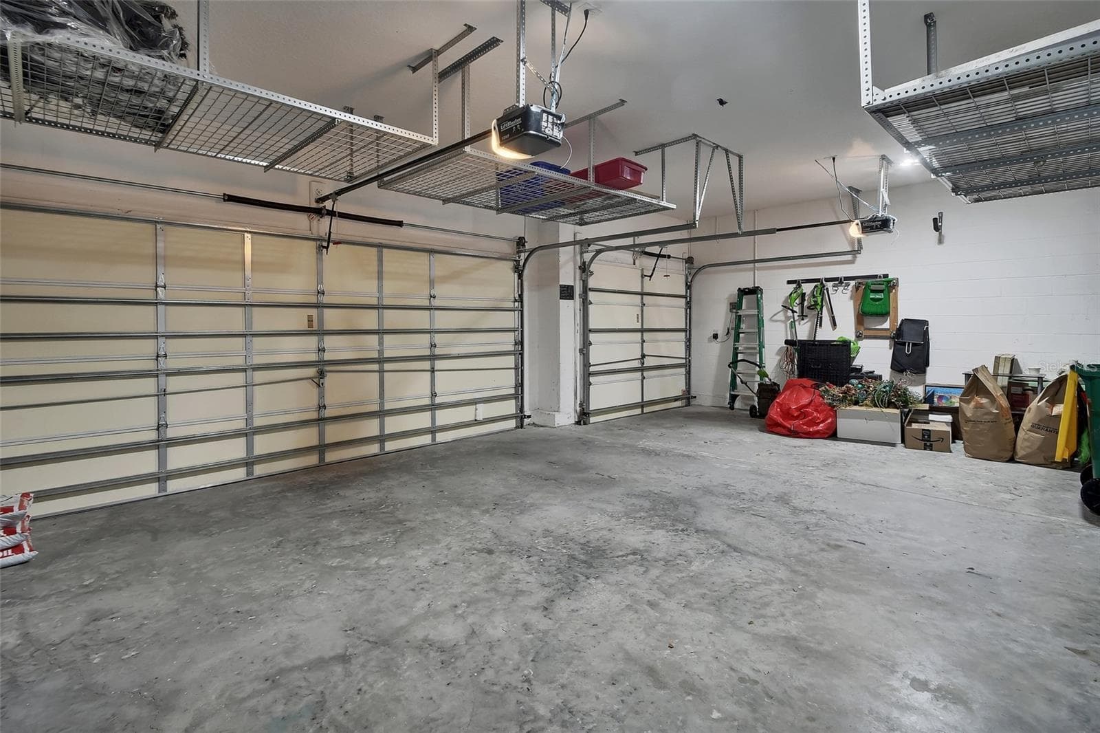 3- large hanging storage racks - 337 ORCHARD HILL ST, DELAND