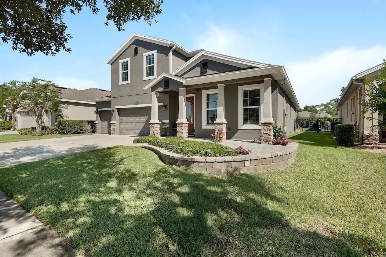 Covered front porch and paver deck - 337 ORCHARD HILL ST, DELAND