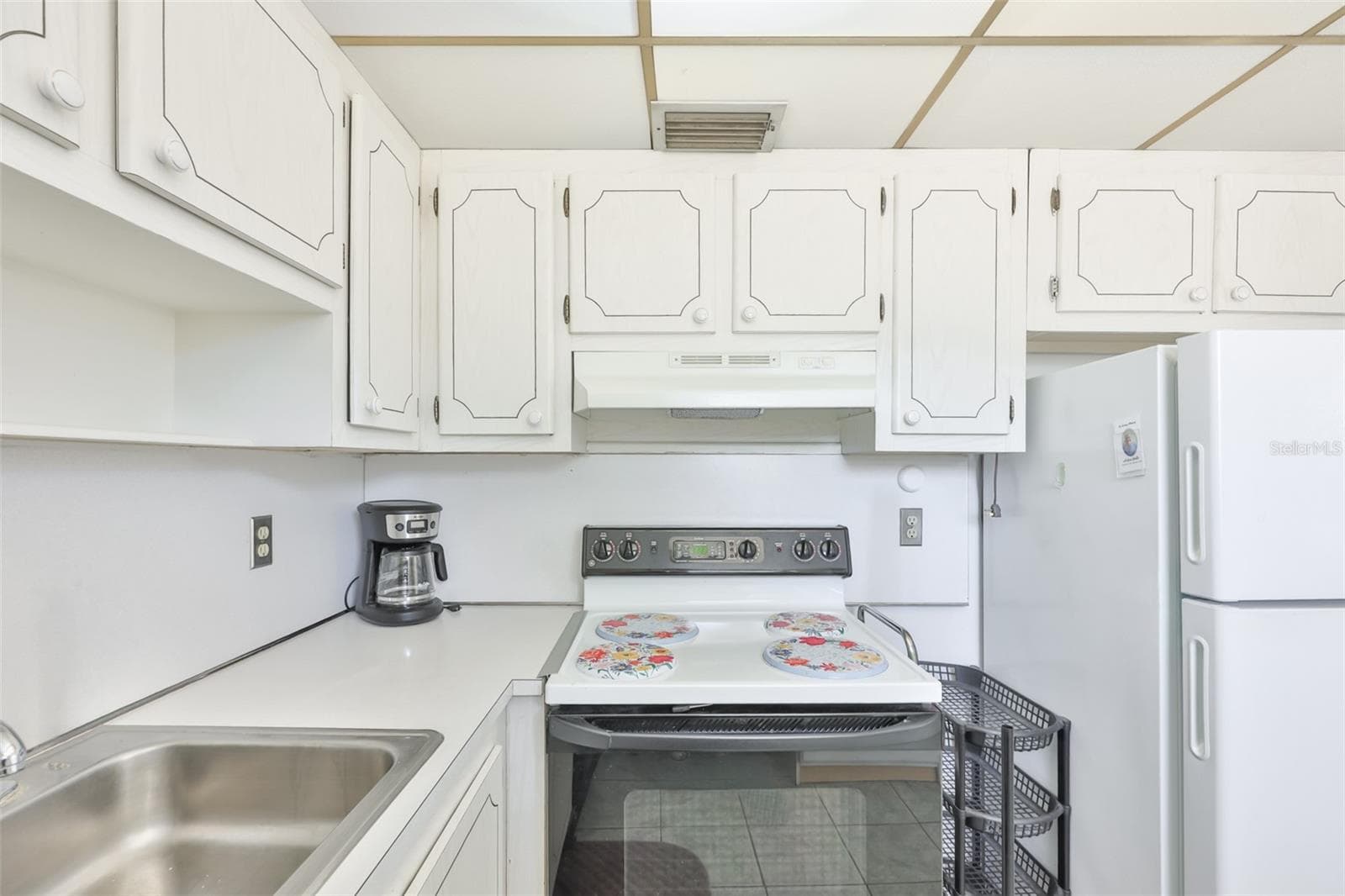 VIEW OF GALLEY KITCHEN - 1802 BEDFORD TER #177, SUN CITY CENTER
