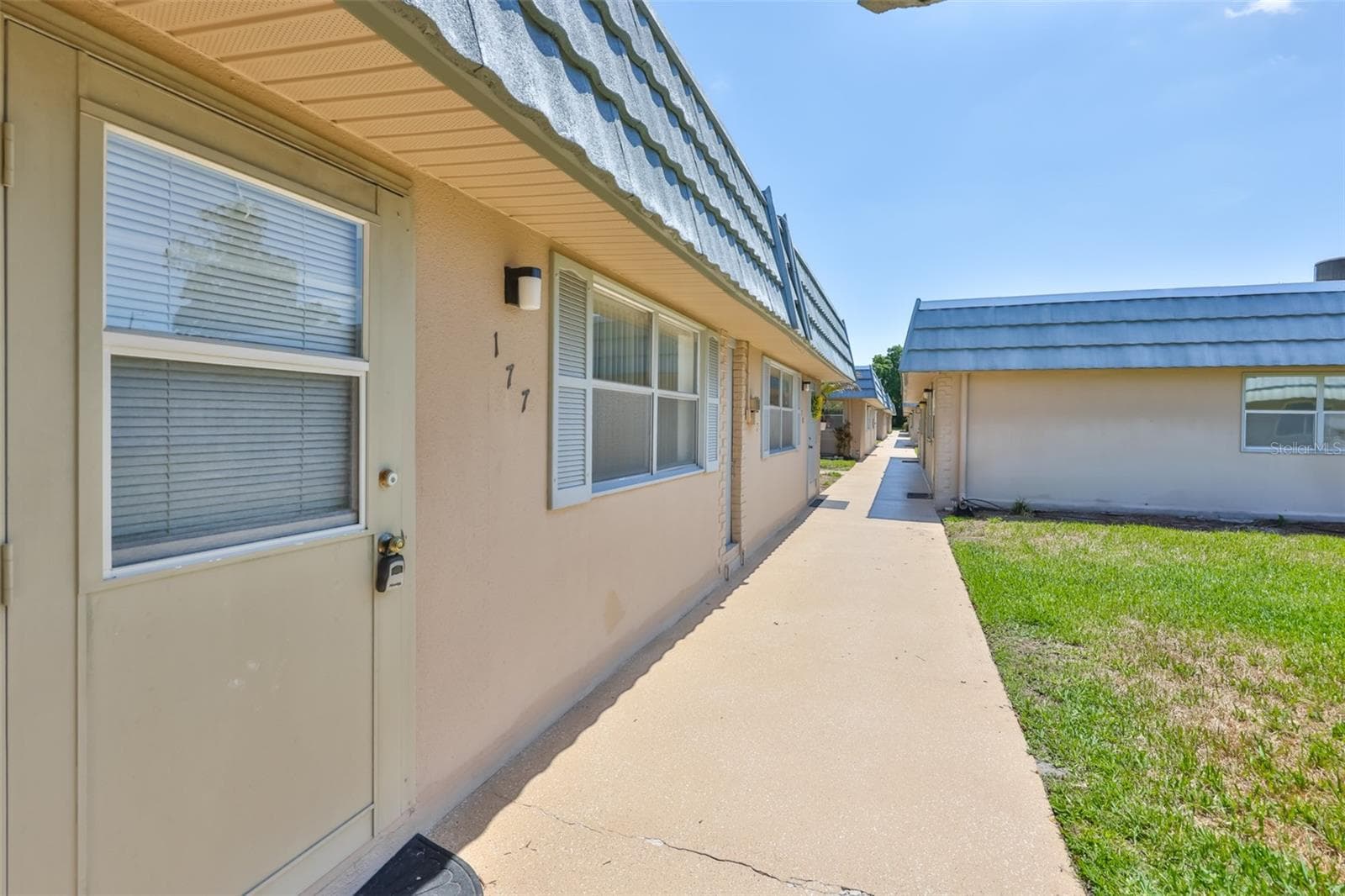 FRONT ENTRANCE TO CONDO. - 1802 BEDFORD TER #177, SUN CITY CENTER