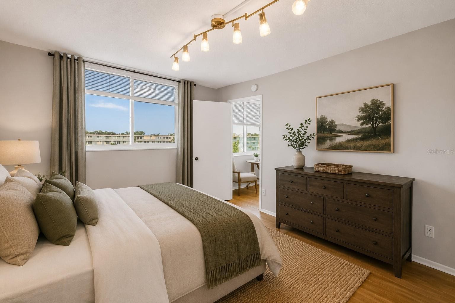 staged bedroom - 4720 LOCUST ST NE #318, ST PETERSBURG